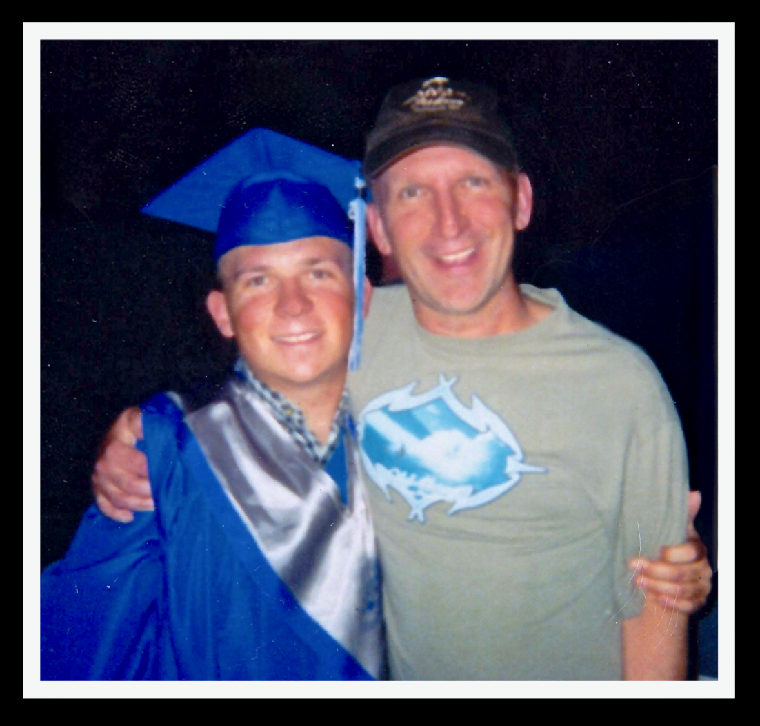 Kevin Adkins at his 2005 graduation with his father Barry